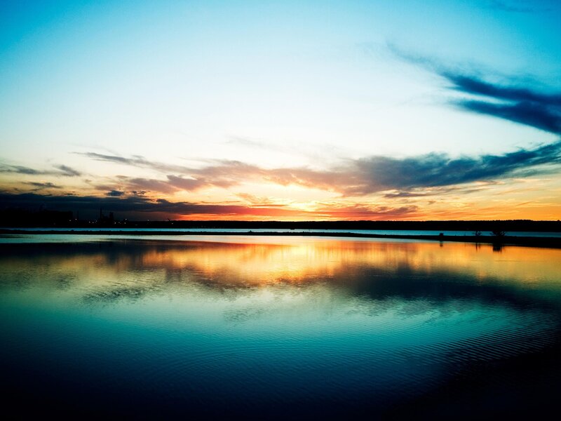 Sunset over Calm Water — Horizon