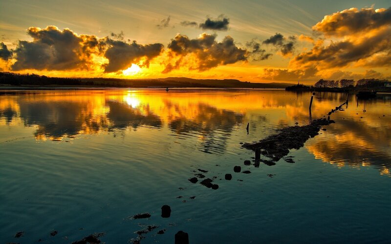 Sunset over Calm Water — Orange, Dramatic, Photograph, Clouds, Land