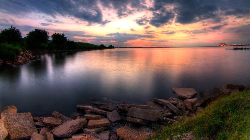 Sunset over Calm Water — Orange, Serene, Photograph, Rocks, Trees