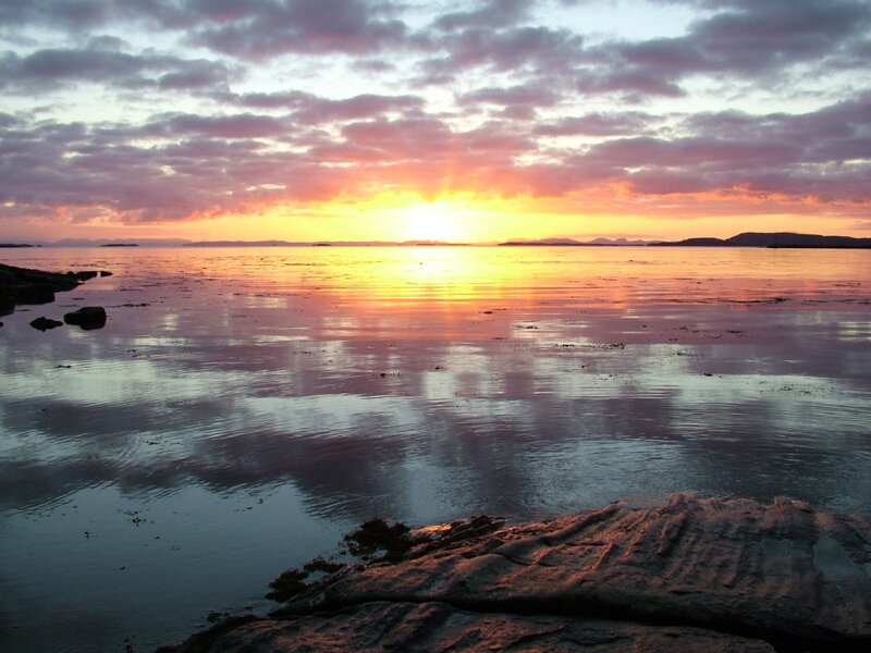 Sunset over Calm Water — Orange, Serene, Photograph, Sky, Clouds, Rocks