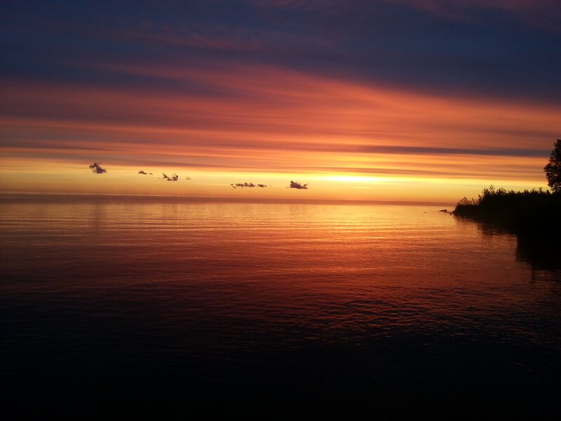 Sunset over Calm Water — Orange, Serene, Photograph, Sky, Clouds, Shoreline