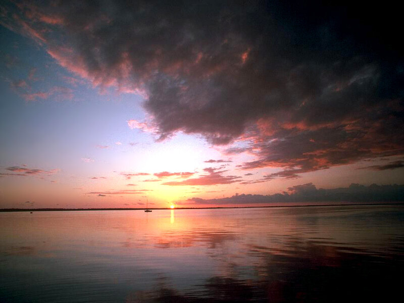 Sunset over Calm Water — Orange, Serene, Photograph, Sun, Clouds