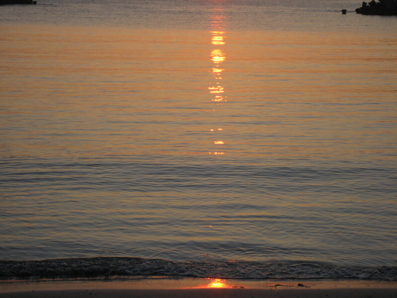 Sunset over Calm Water — Orange, Serene, Photograph