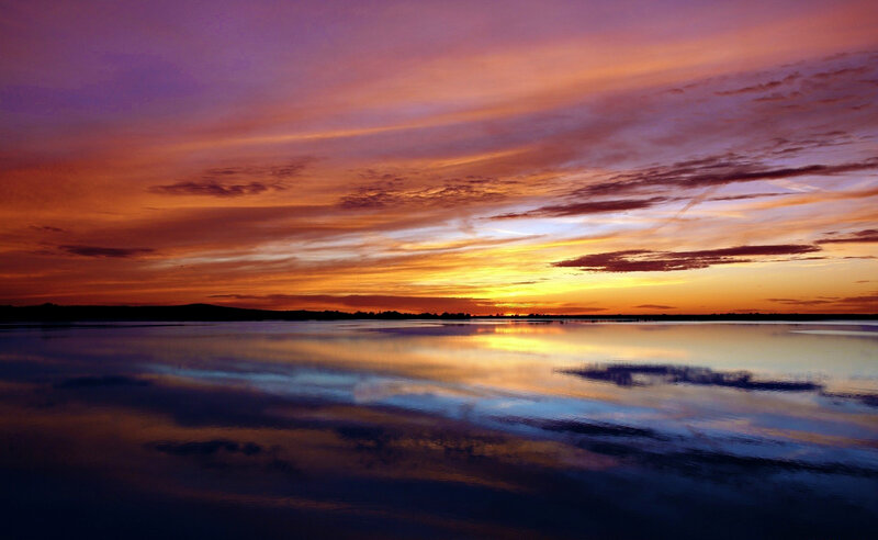 Sunset over Calm Water — Purple, Serene, Photograph
