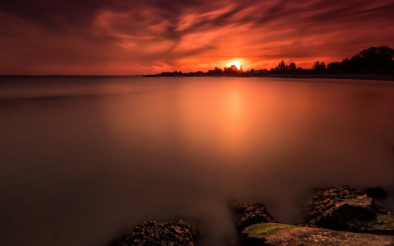Sunset over Calm Water — Red, Dramatic, Photograph