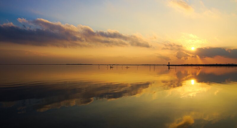 Sunset over Calm Water — Yellow, Serene, Photograph, Sun