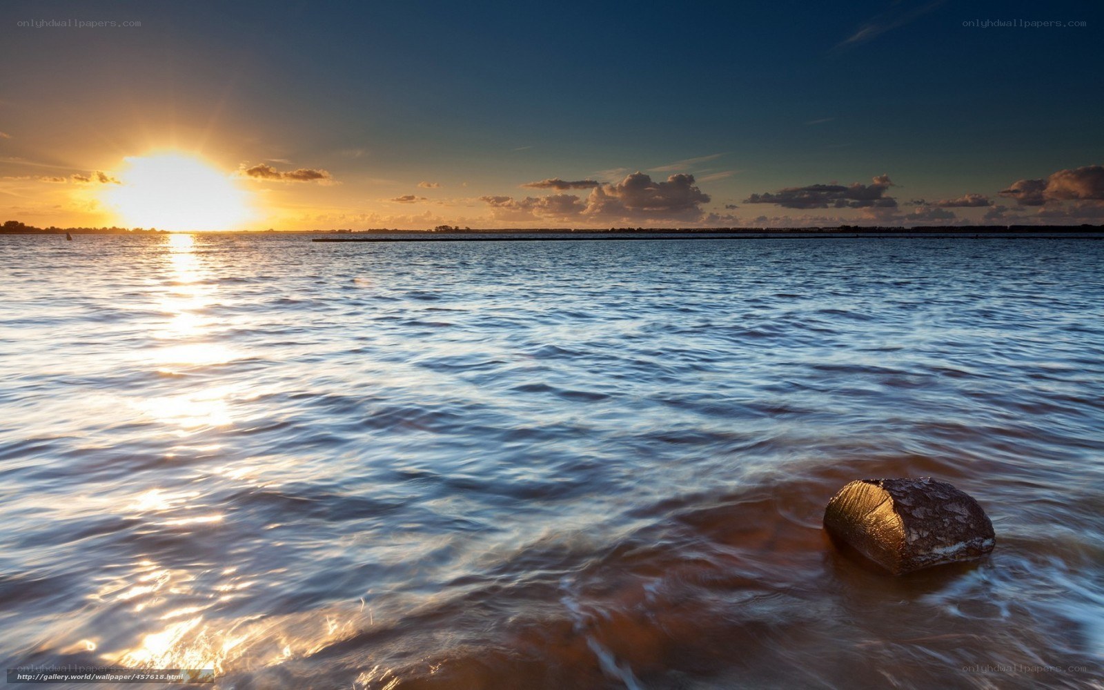 Sunset over calm waters