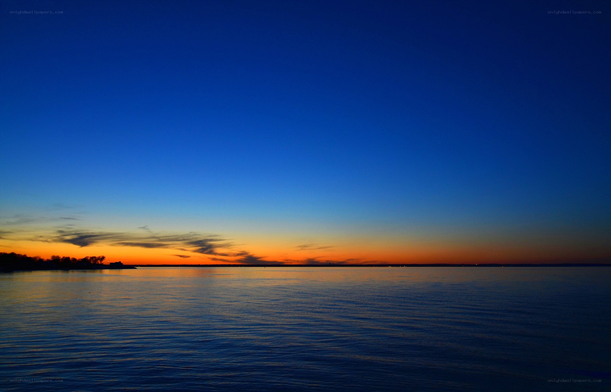 sunset over calm waters