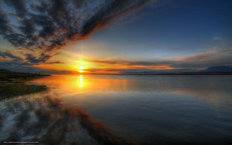 sunset over calm waters