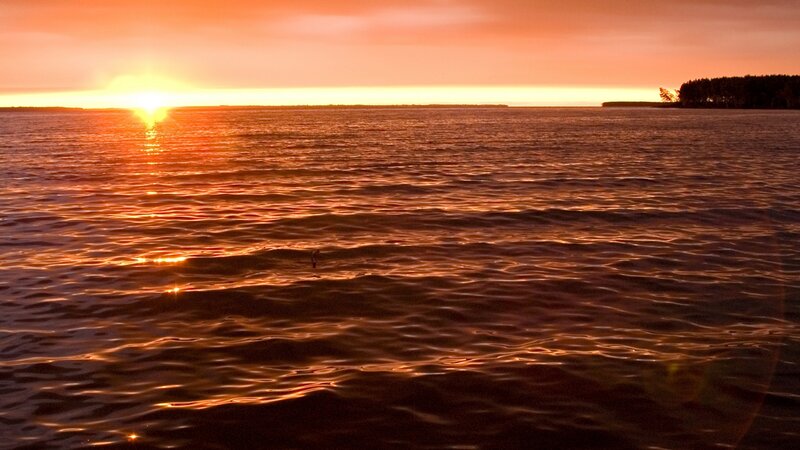 Sunset over calm waters