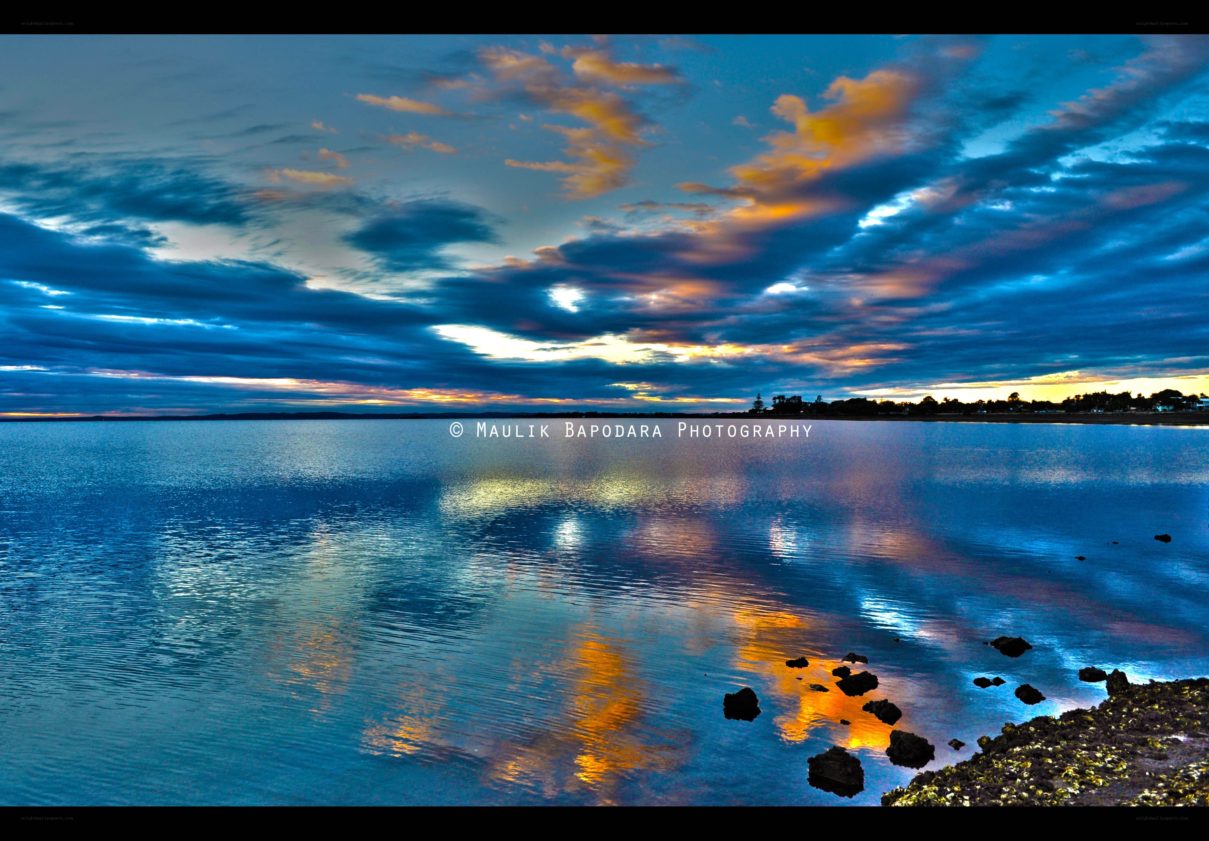 Sunset over calm waters