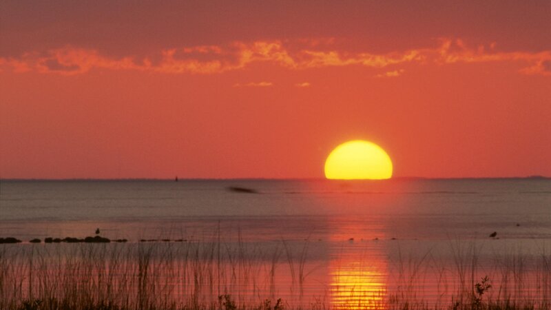 Sunset over calm waters