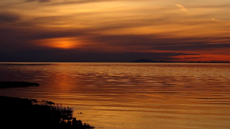 Sunset over calm waters