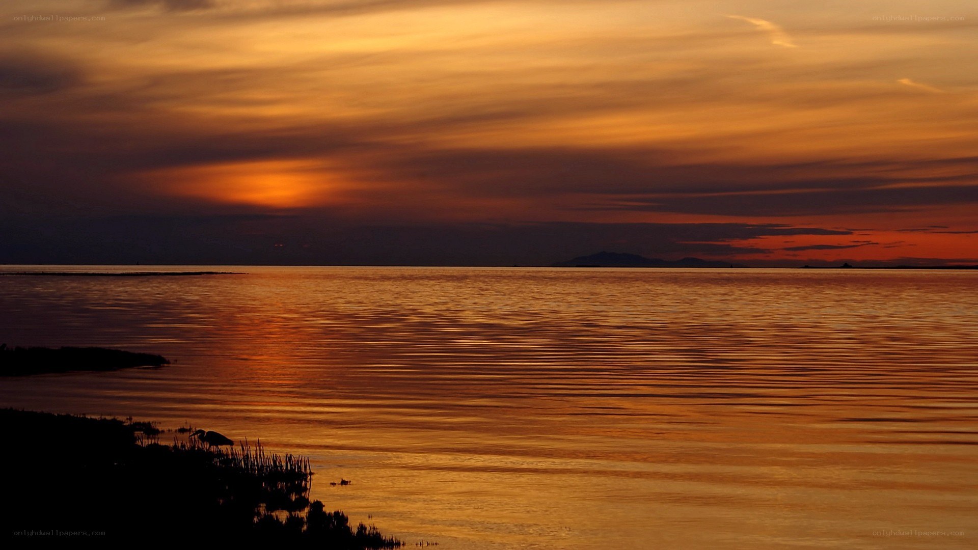 Sunset over calm waters