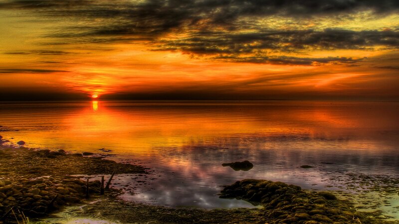 sunset over calm waters