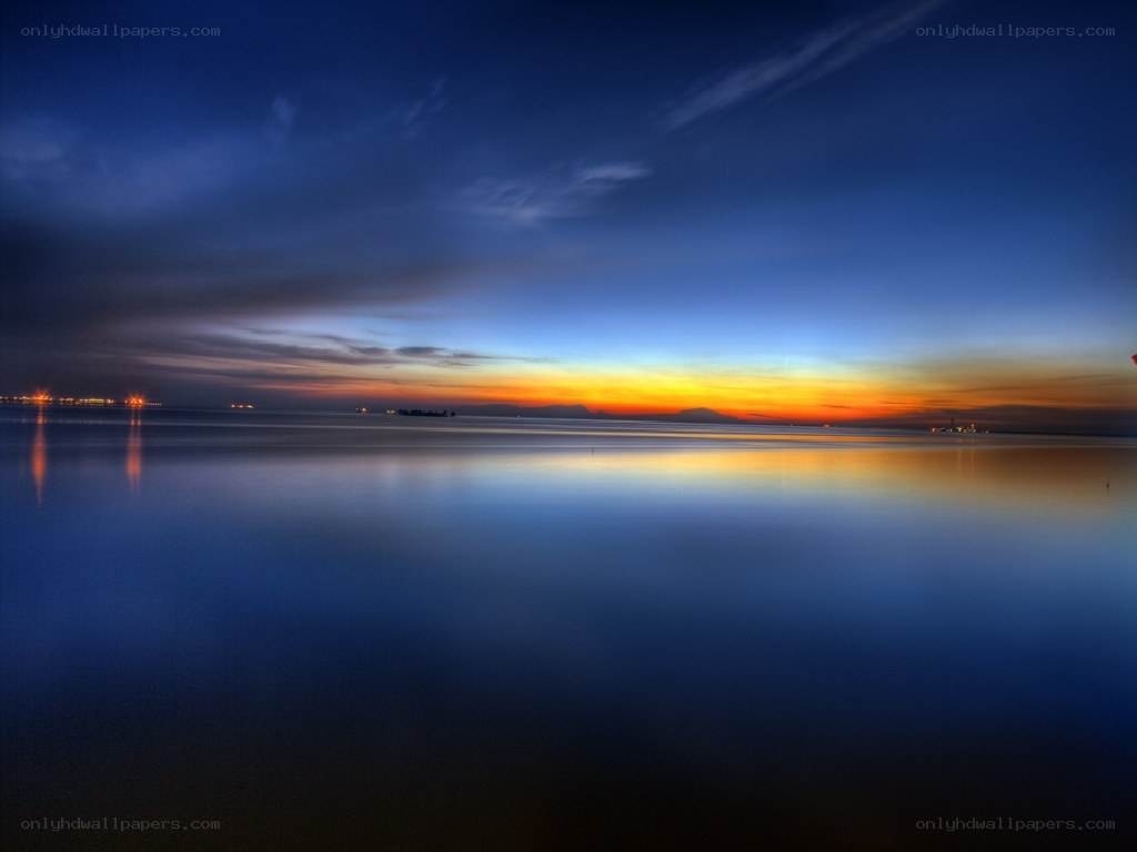 sunset over calm waters