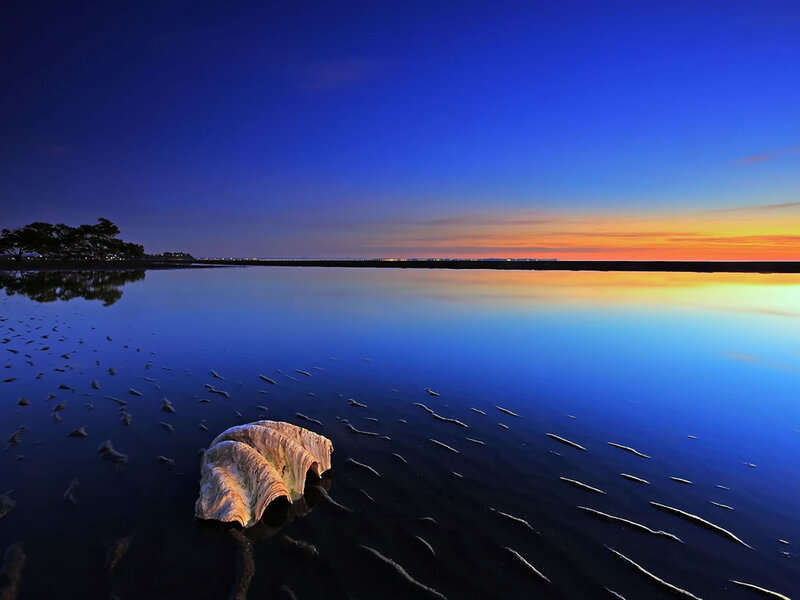 Sunset over calm waters