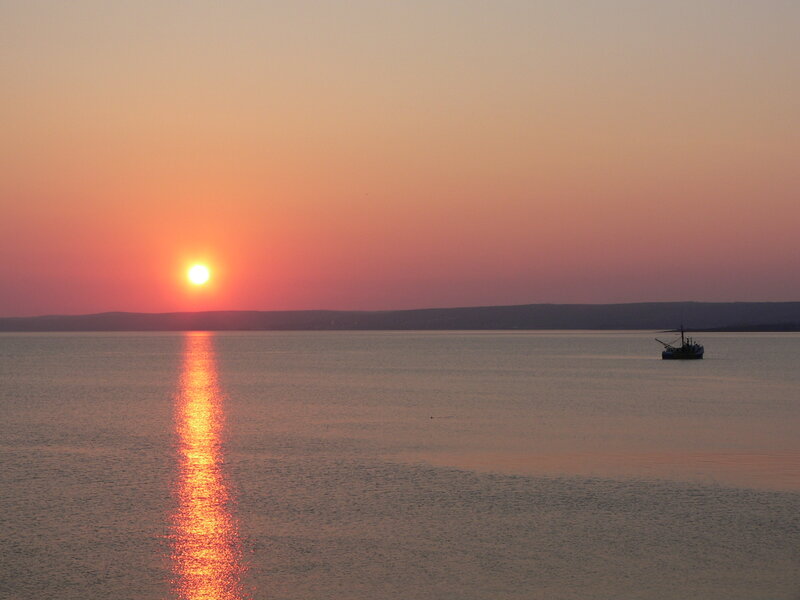 Sunset over calm waters