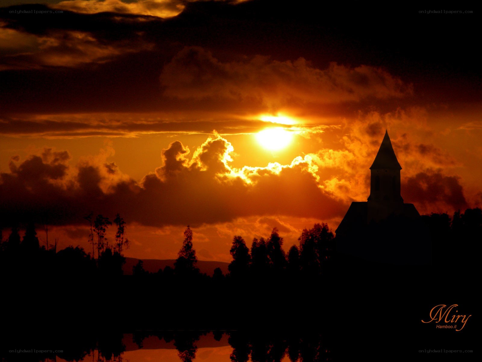 Sunset over church silhouette
