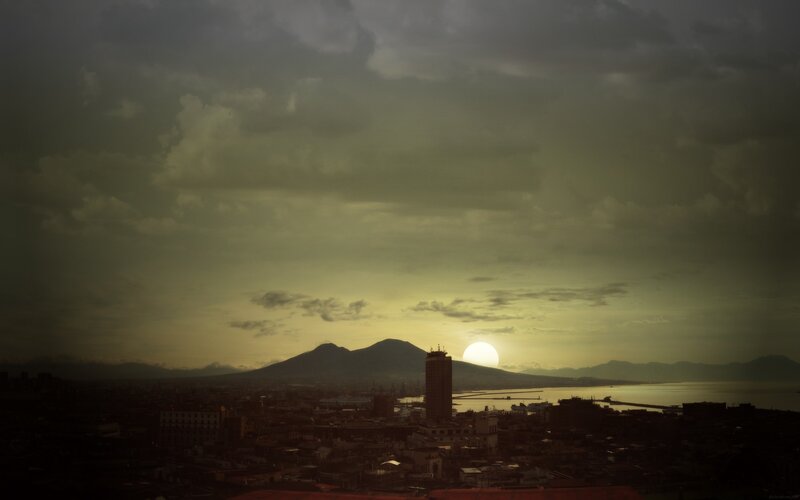 Sunset over City and Mountain