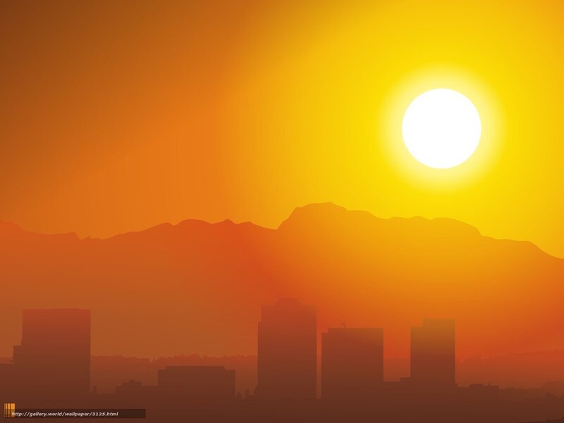 Sunset over city and mountains