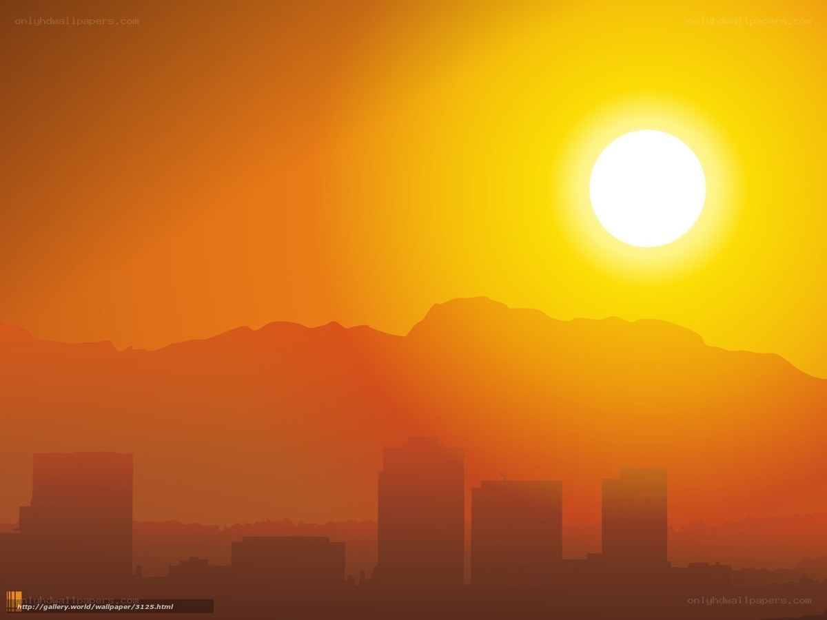 Sunset over city and mountains