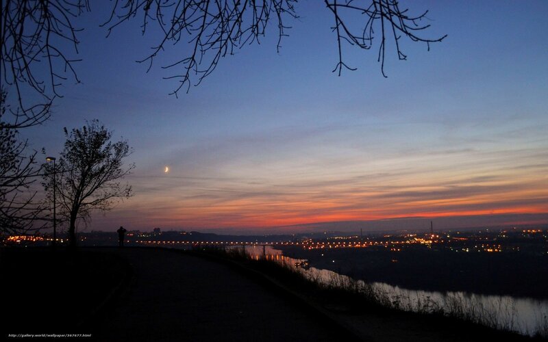 Sunset over city and river