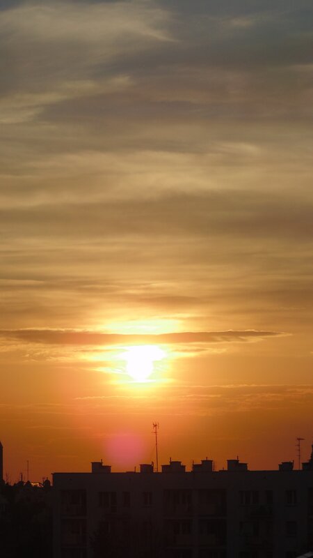 Sunset over city buildings