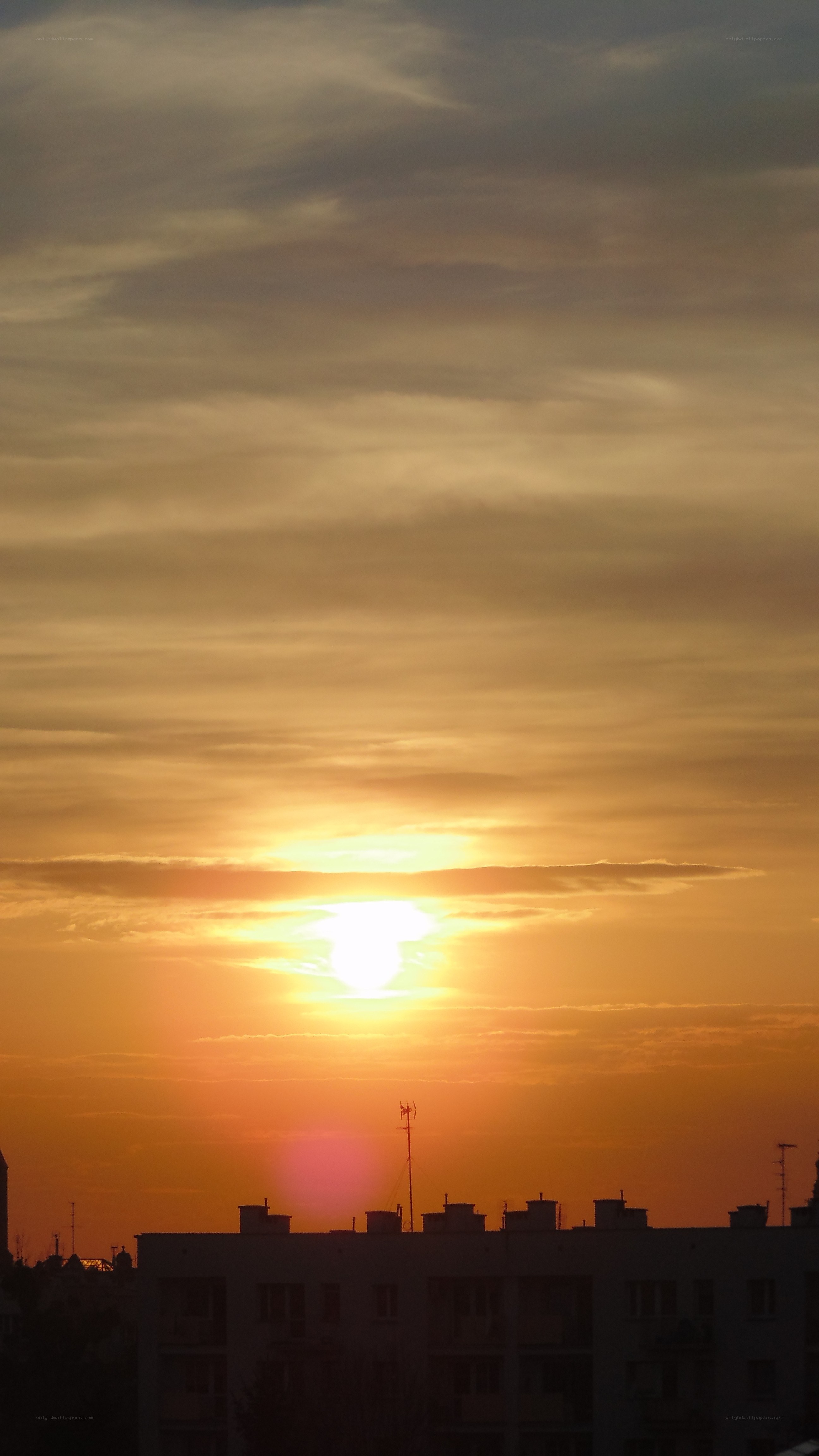 Sunset over city buildings