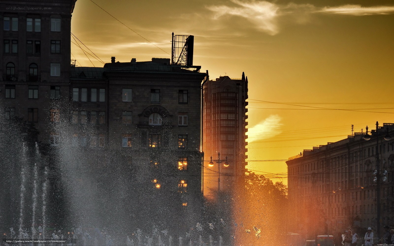 Sunset over city fountain