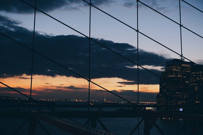Sunset over city from bridge