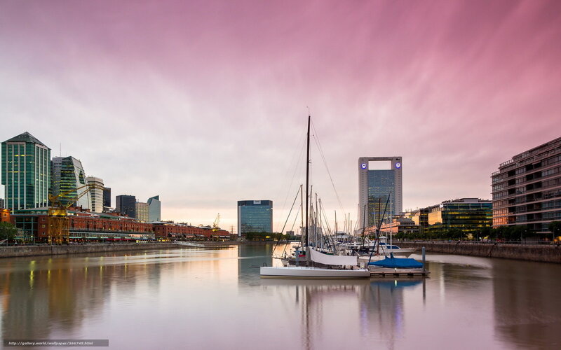 sunset over city harbor