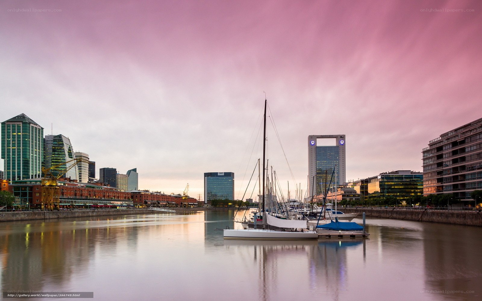 sunset over city harbor