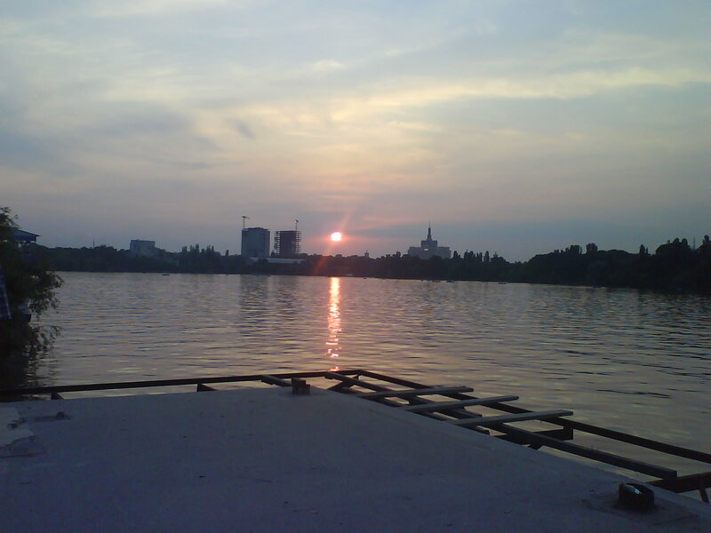 sunset over city lake