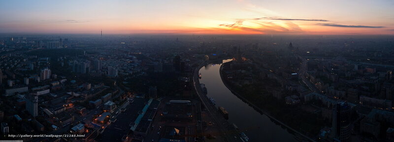 Sunset over city river