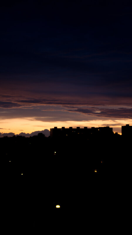 sunset over city silhouette
