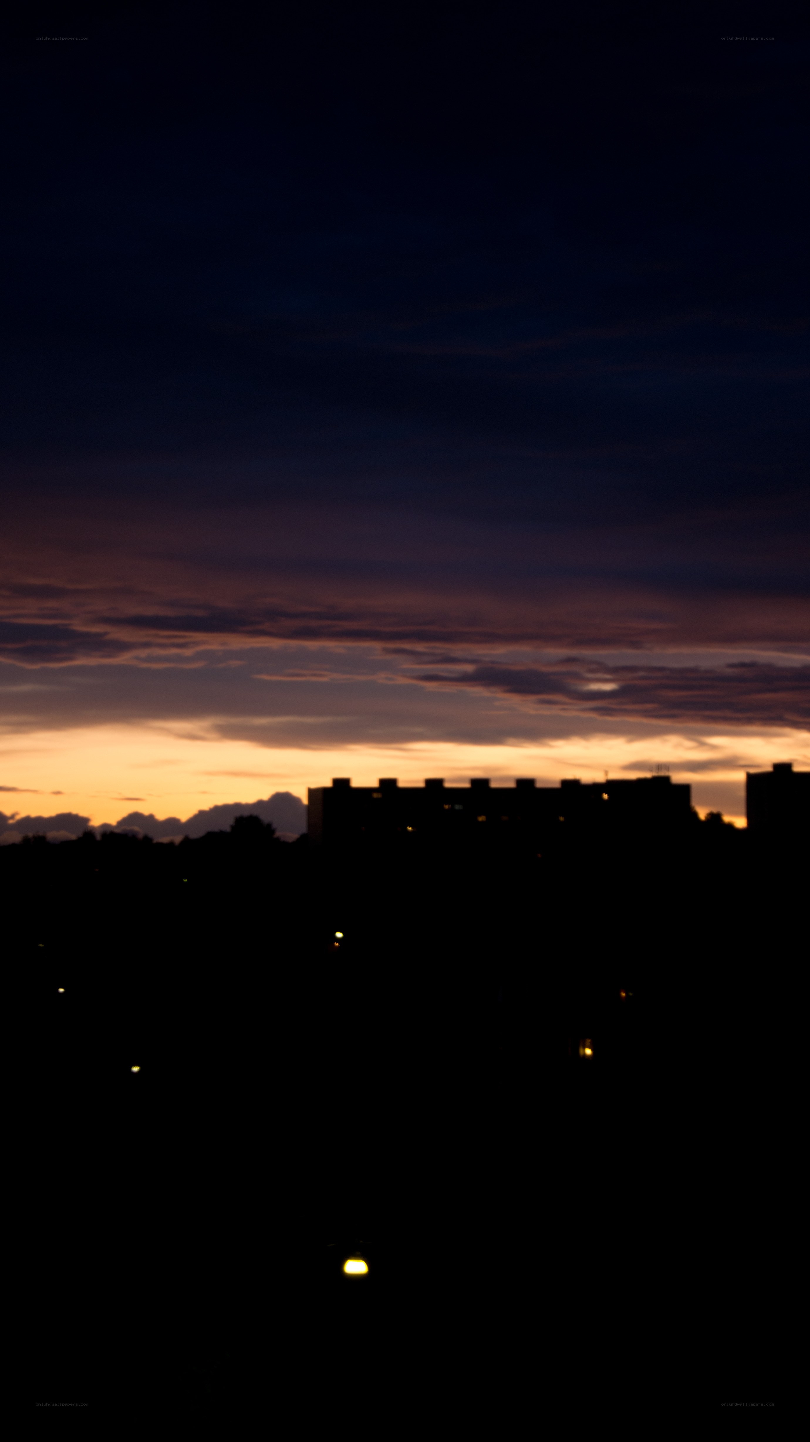 sunset over city silhouette