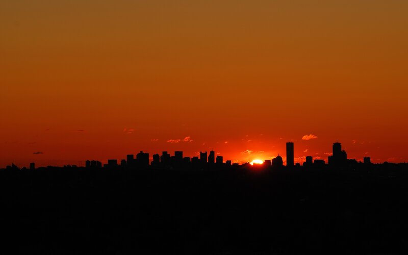 Sunset over city skyline