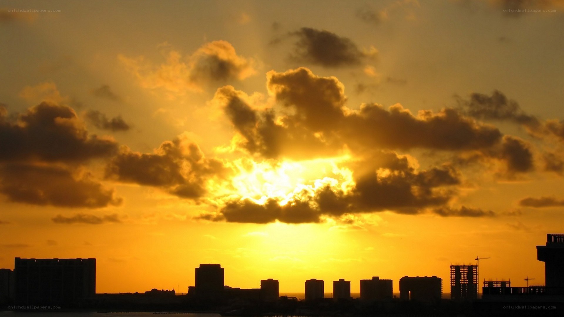 sunset over city skyline