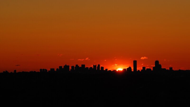 sunset over city skyline