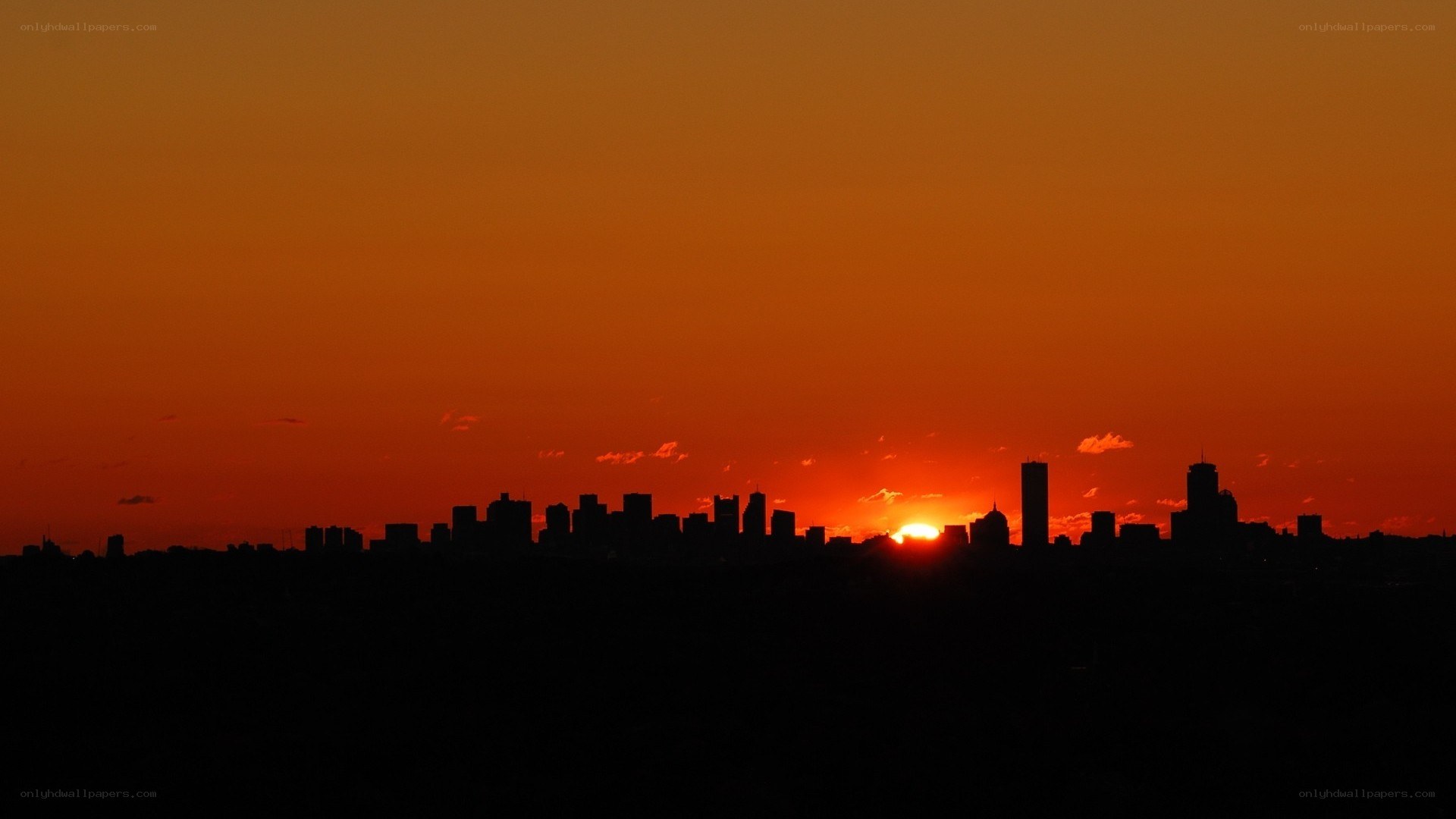 sunset over city skyline