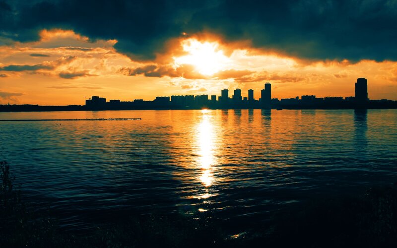 Sunset over city skyline