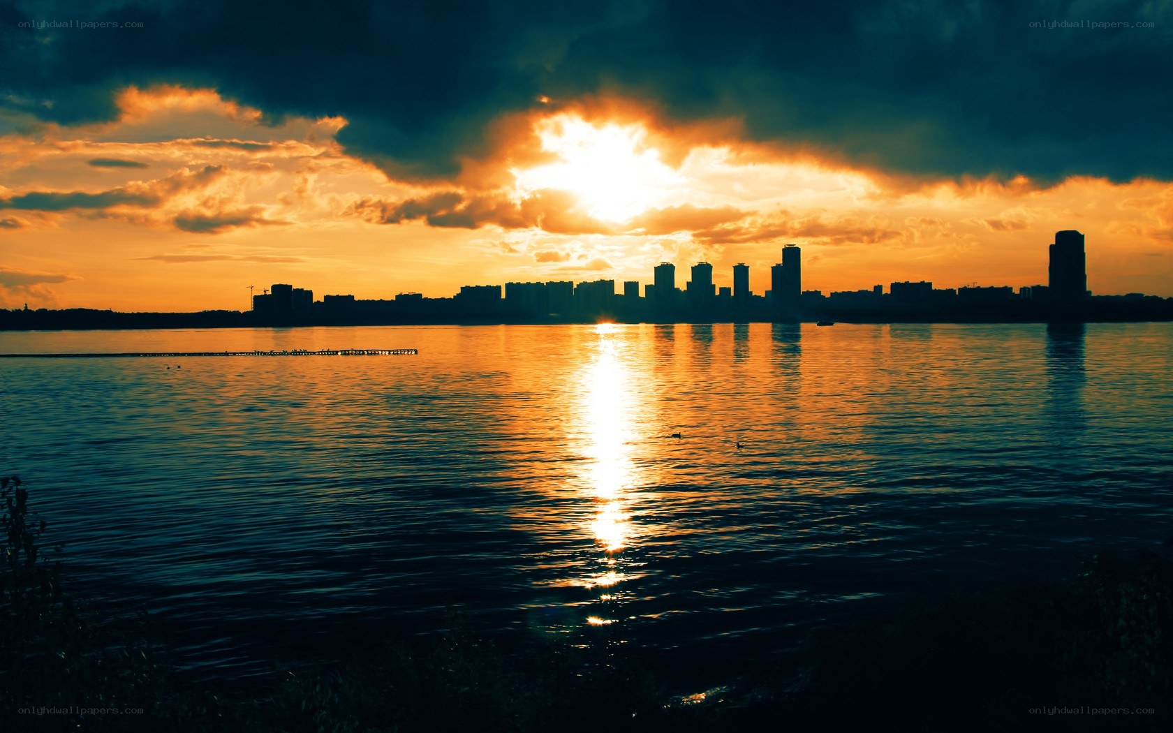 Sunset over city skyline