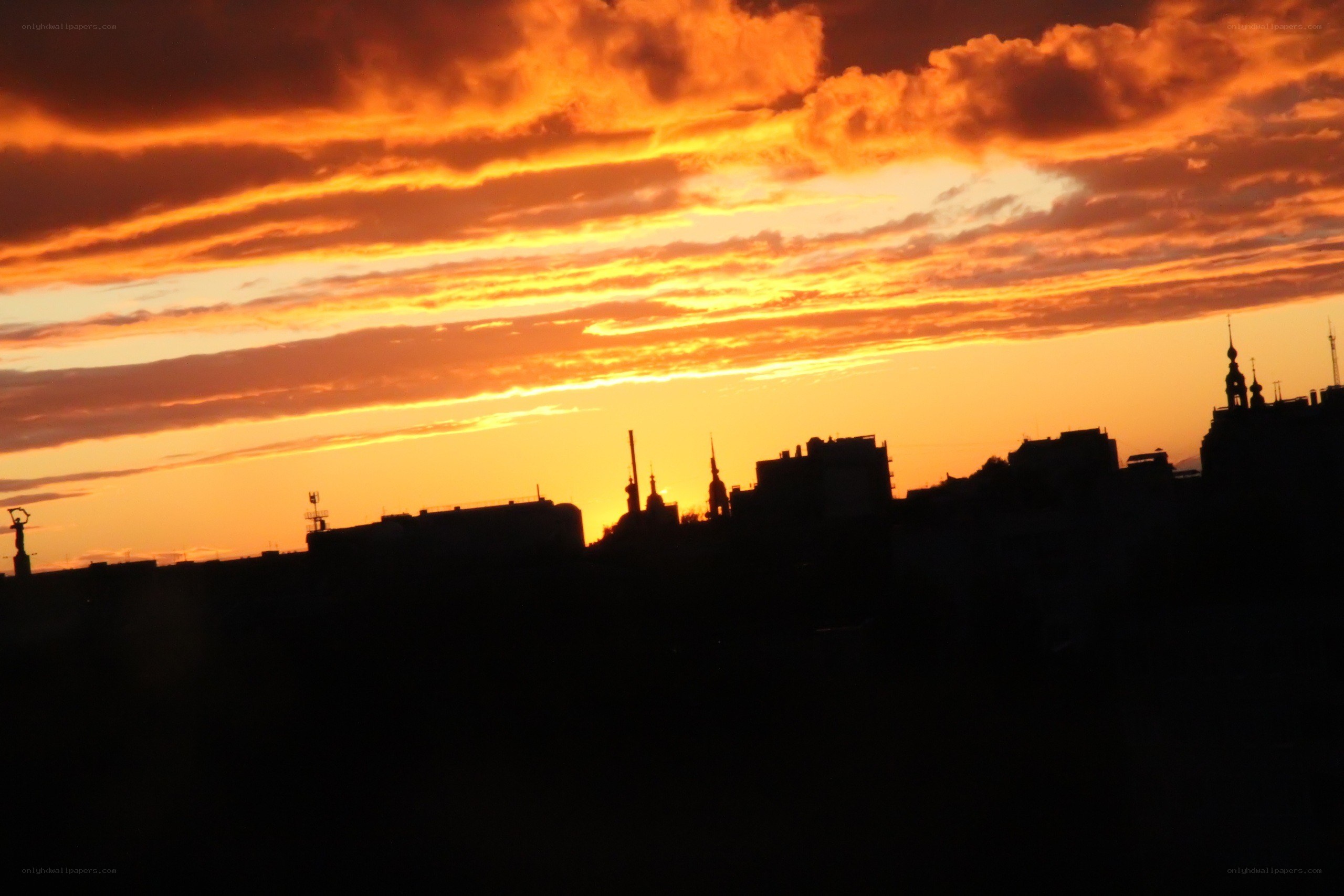 sunset over city skyline