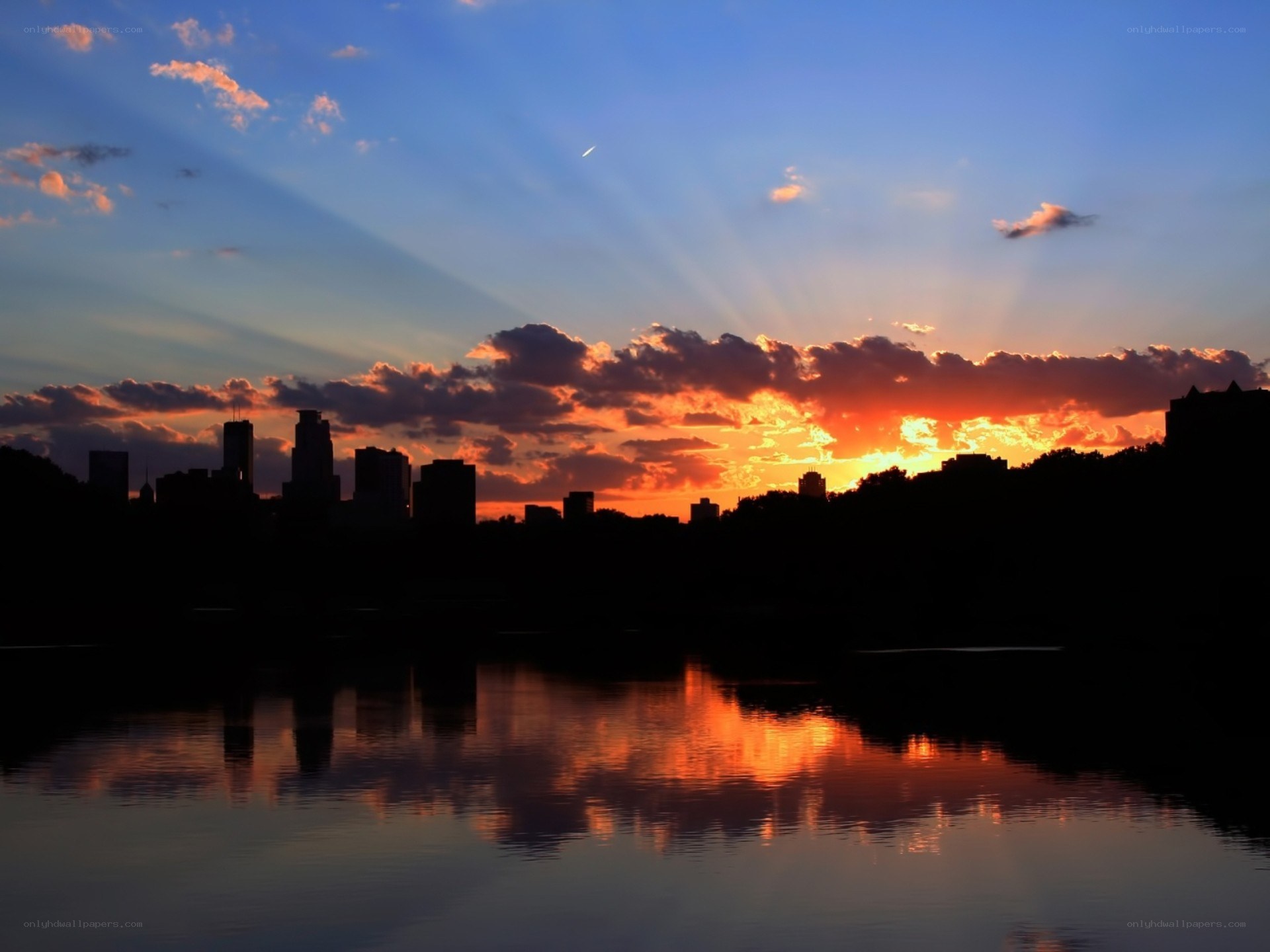 sunset over city skyline