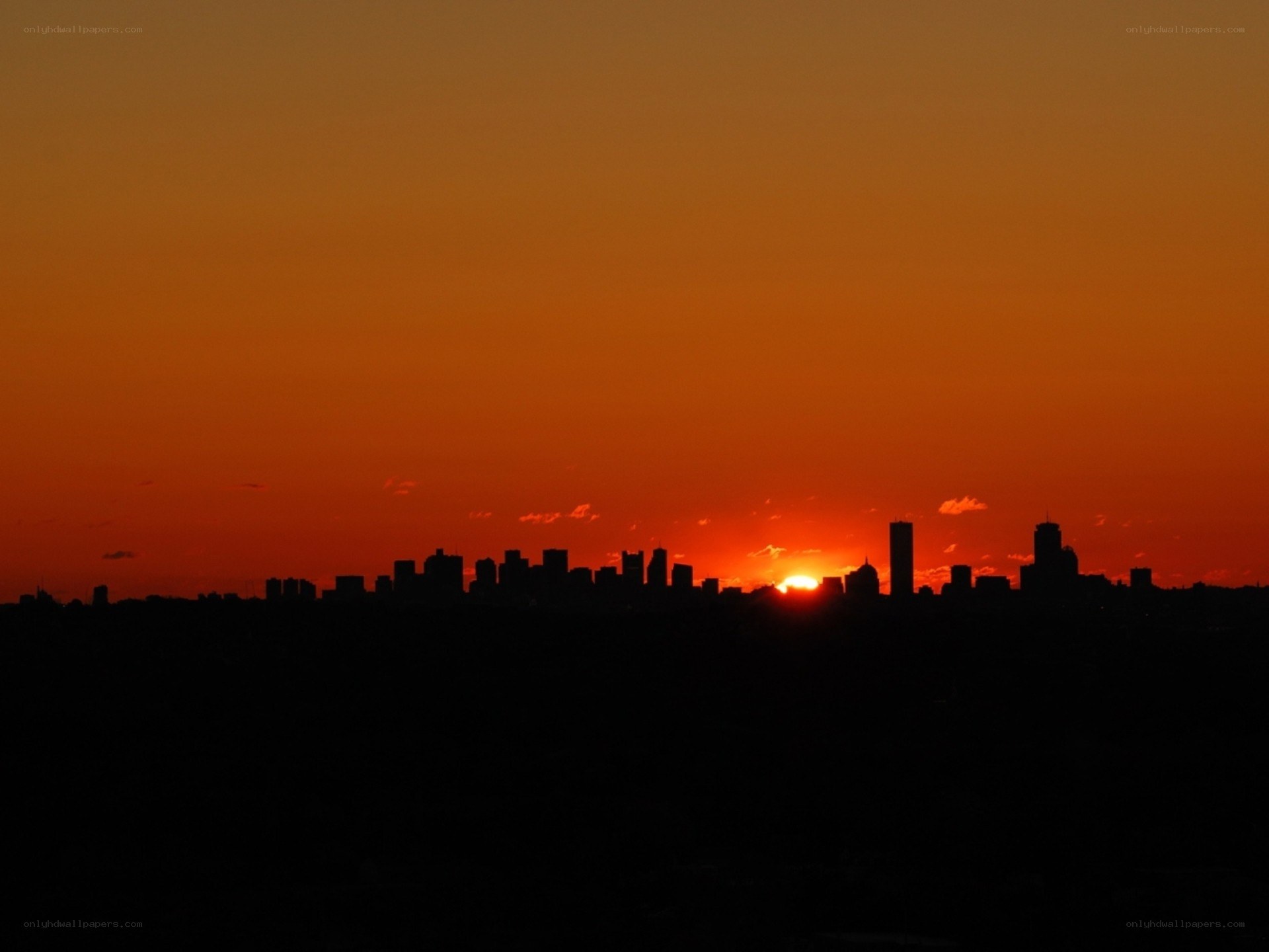sunset over city skyline