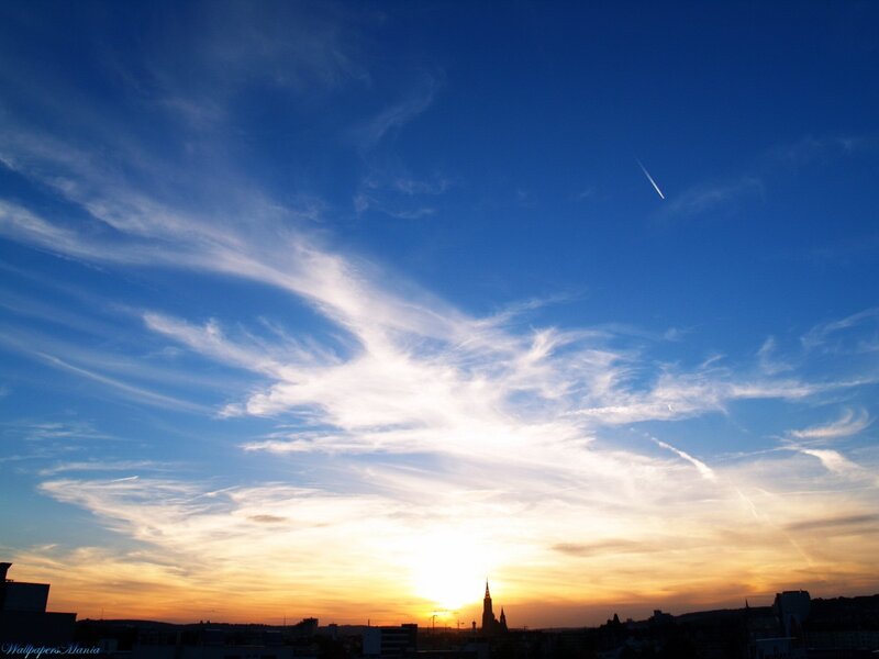 Sunset over city skyline
