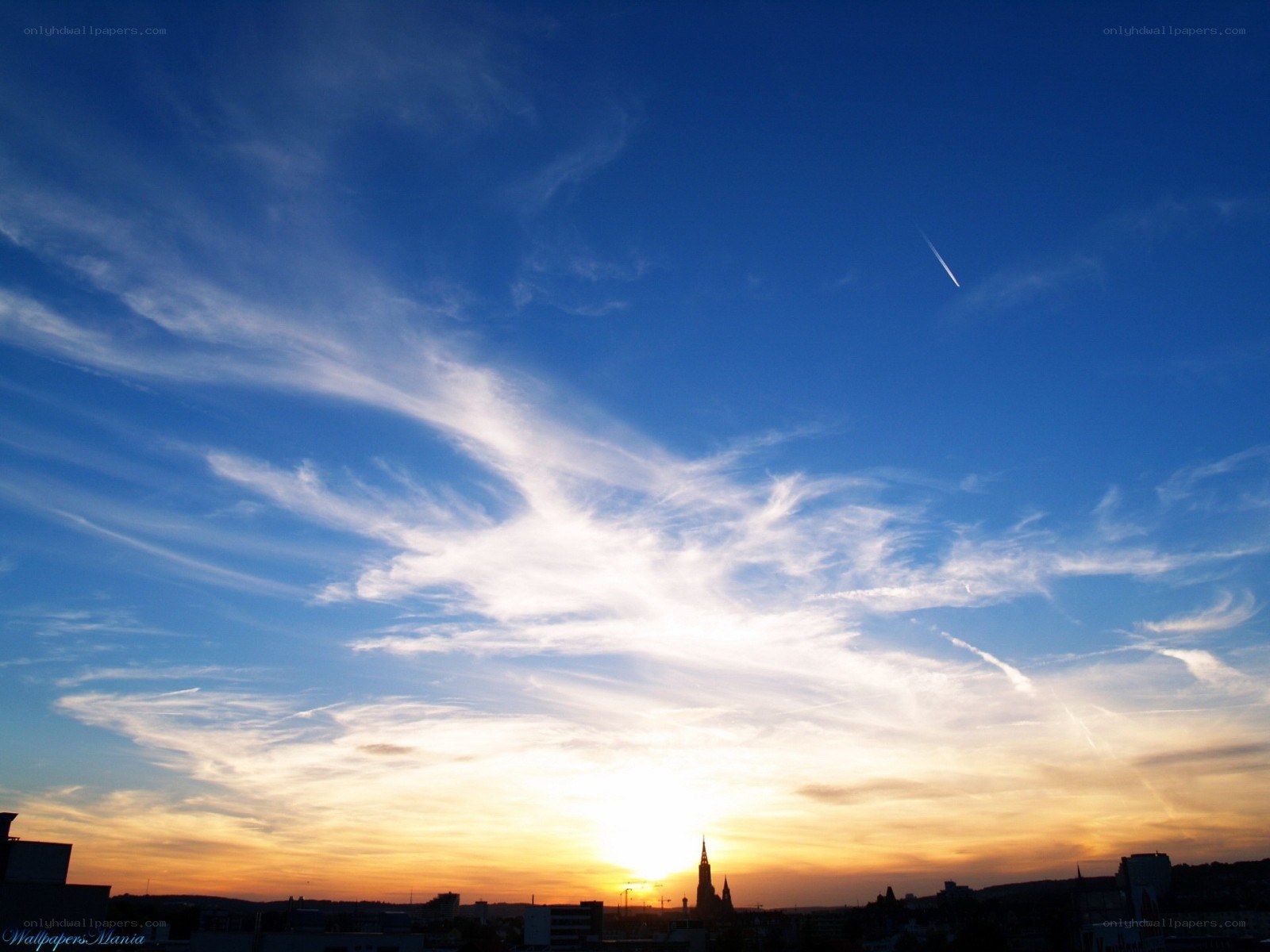 Sunset over city skyline