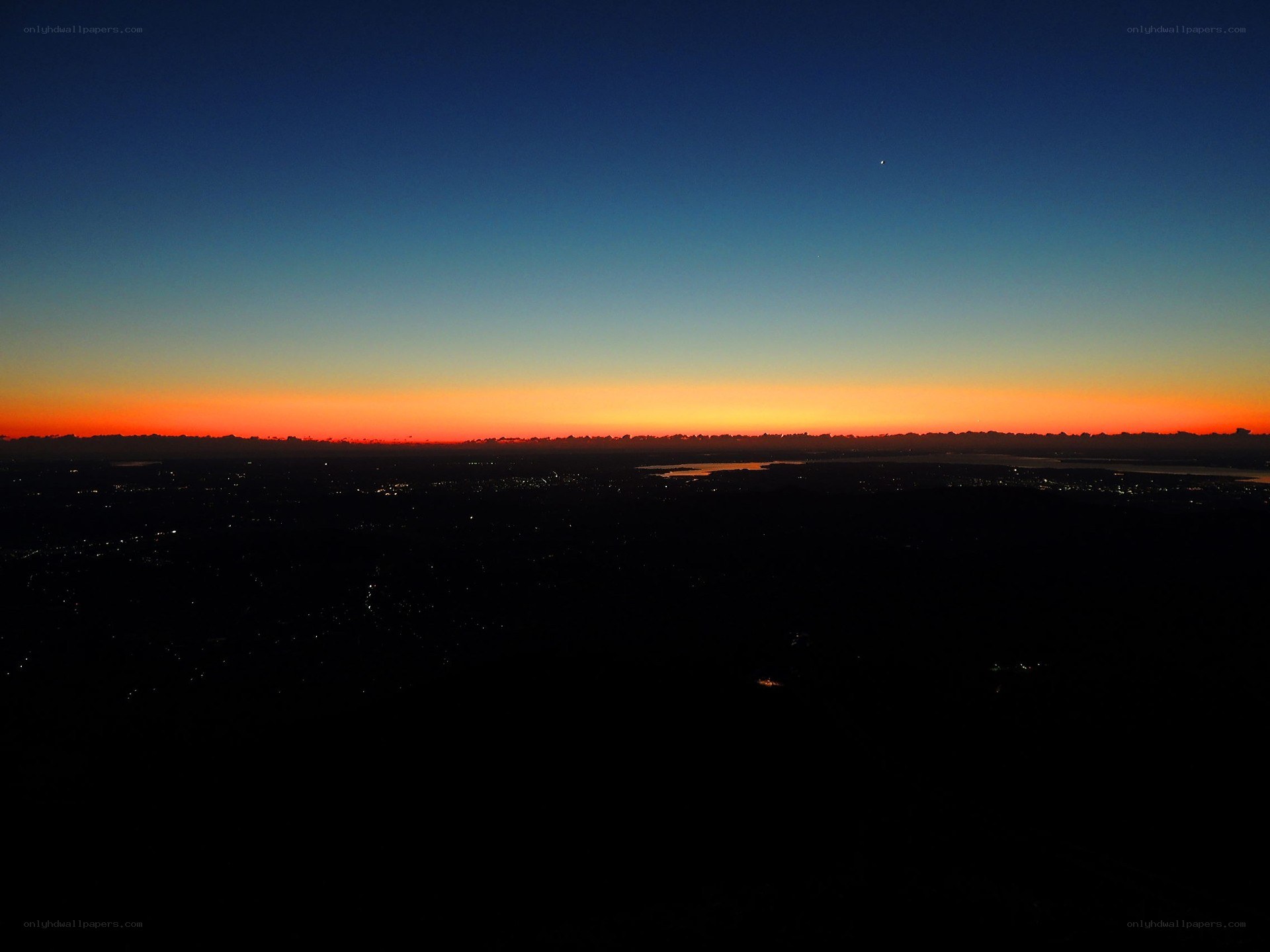 sunset over city skyline