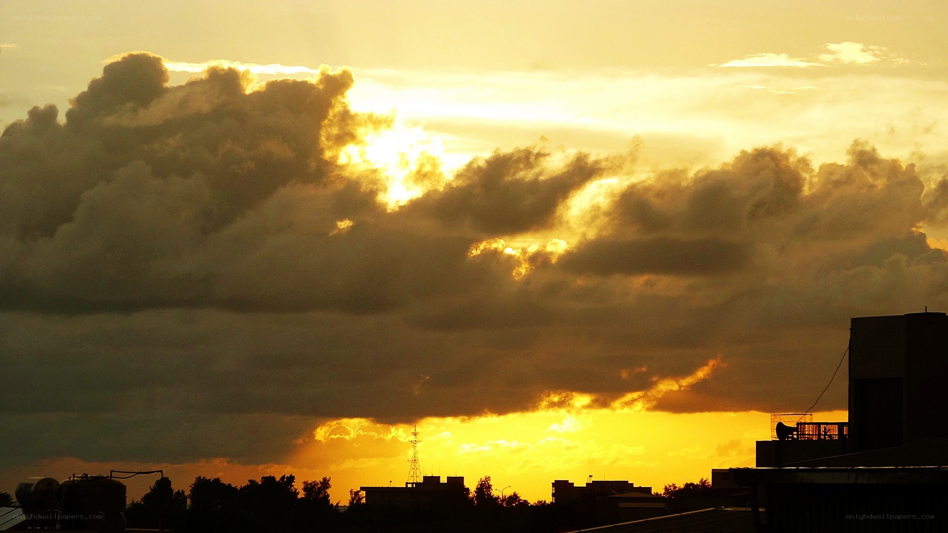 sunset over city skyline